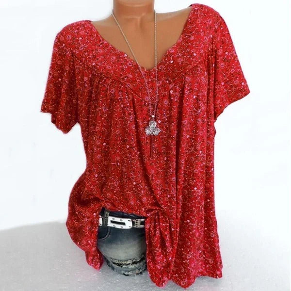 Nerea - Blusa estampada con escote de pico