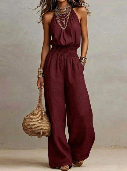 Lorena - Mono elegante con cuello halter y pernera amplia