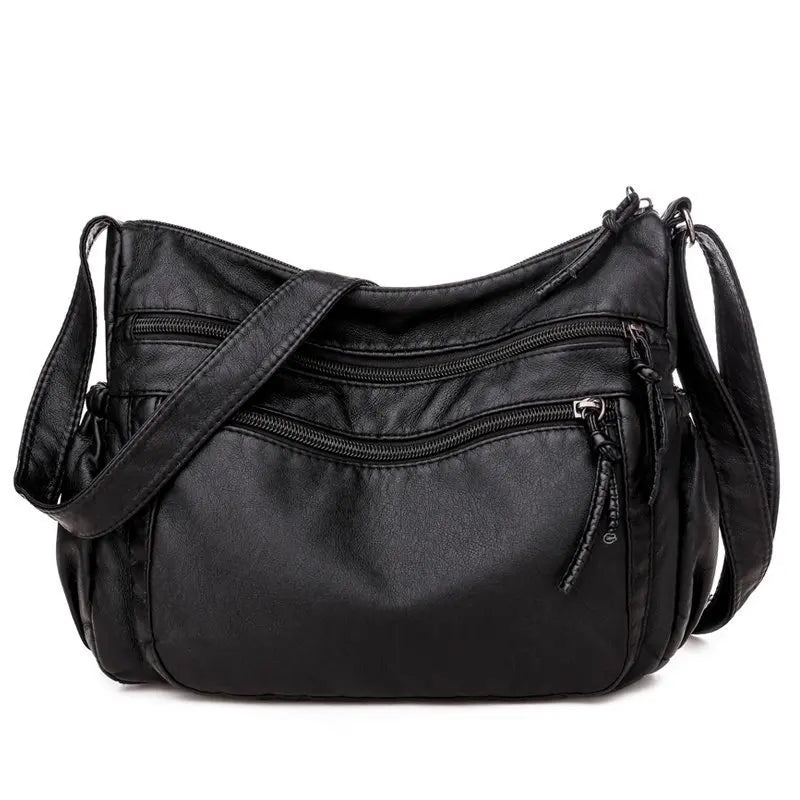VANILLE - Bolso multibolsillos en bandolera en cuero - Negro - CARMEN VELVET