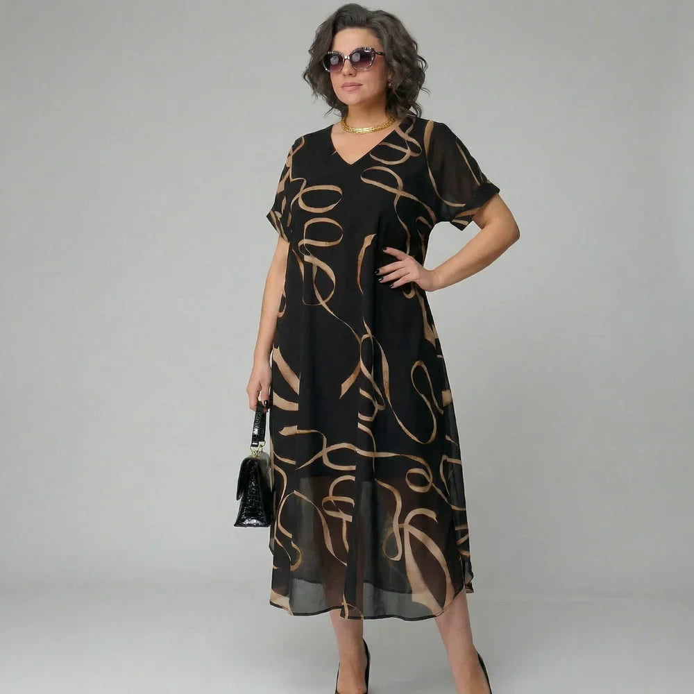 Elea - Vestido con volante y motivo dorado