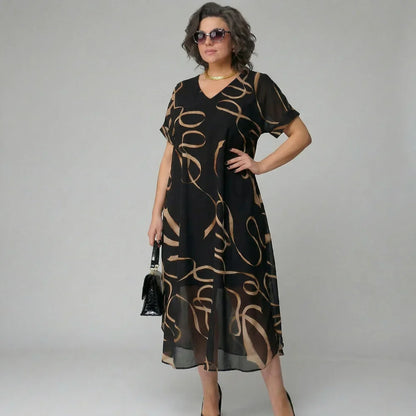 Elea - Vestido con volante y motivo dorado