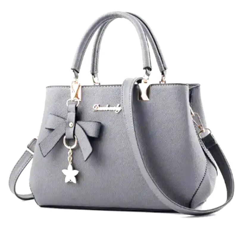 EUTERPE - Bolso espacioso con bandolera en cuero granulado - Gris - CARMEN VELVET