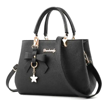 EUTERPE - Bolso espacioso con bandolera en cuero granulado - Negro - CARMEN VELVET