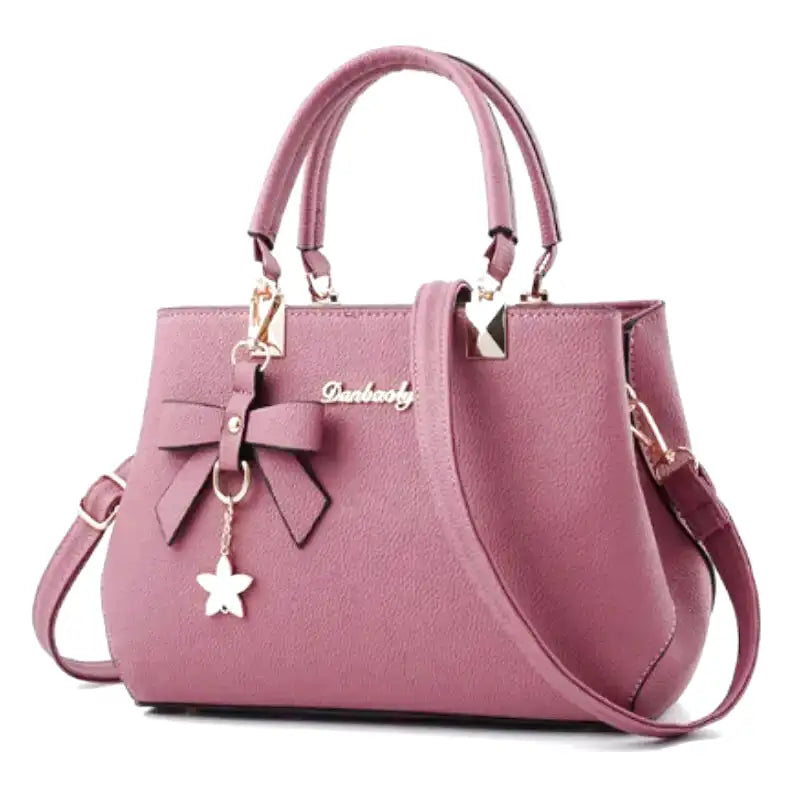 EUTERPE - Bolso espacioso con bandolera en cuero granulado - Rosa - CARMEN VELVET