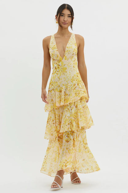 Oriana - Vestido largo floral con detalle de volantes