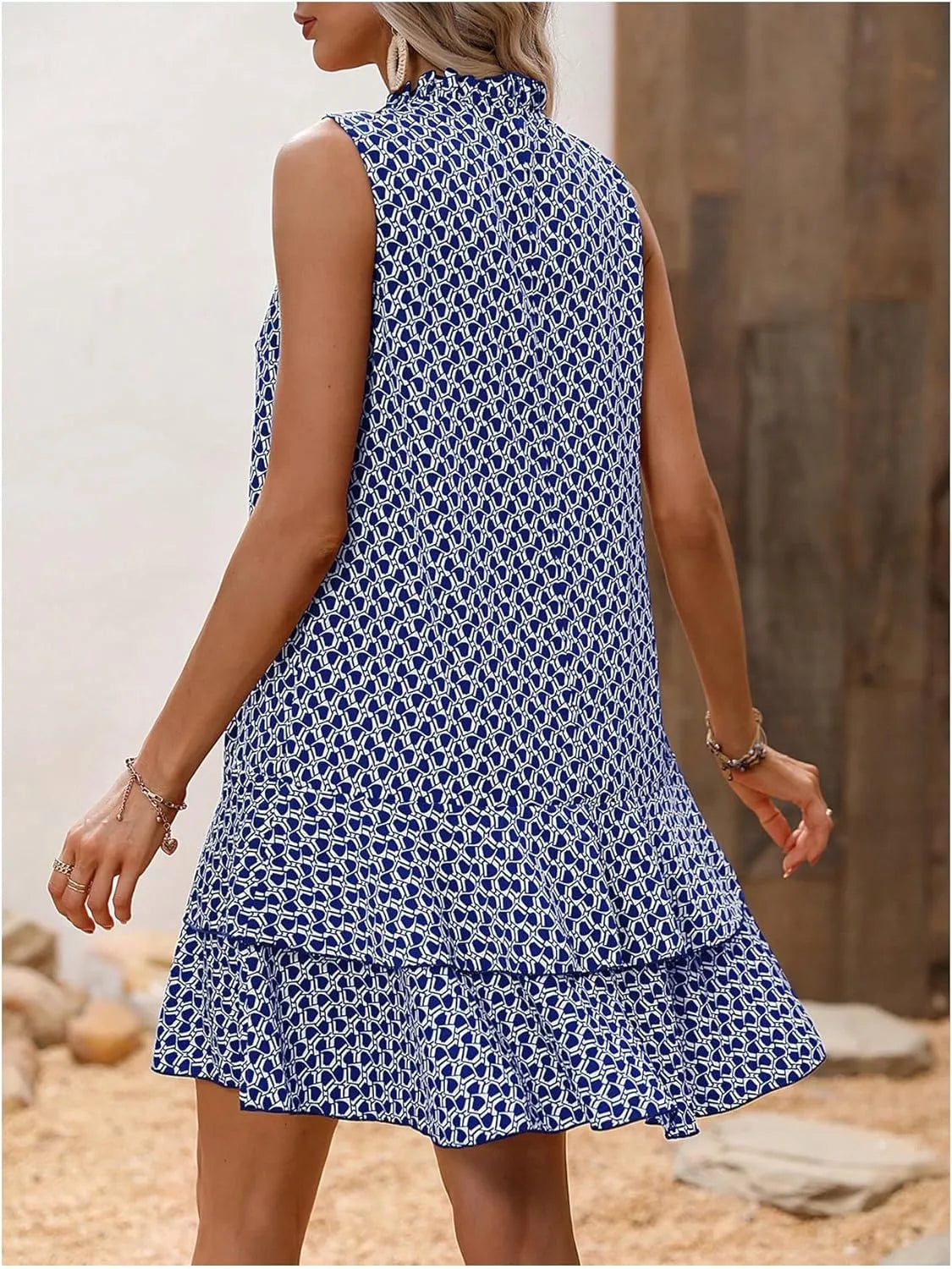 Candela - Vestido sin mangas con motivo elegante y caída ligera