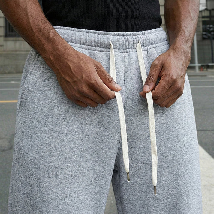 Adrián - Pantalón deportivo de corte relajado con cordón y bolsillos