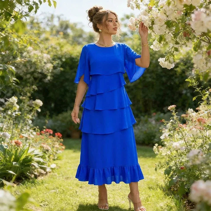 Amelia - Elegante vestido con mangas con detalle de volantes en capas