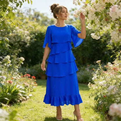 Amelia - Elegante vestido con mangas con detalle de volantes en capas
