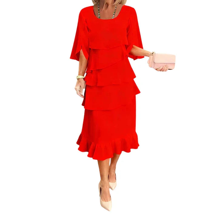 Amelia - Elegante vestido con mangas con detalle de volantes en capas