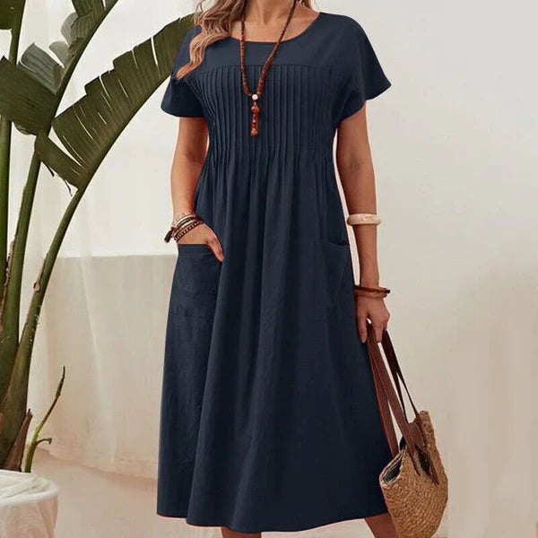 Emma - Vestido de textura plisada con mangas cortas y bolsillos