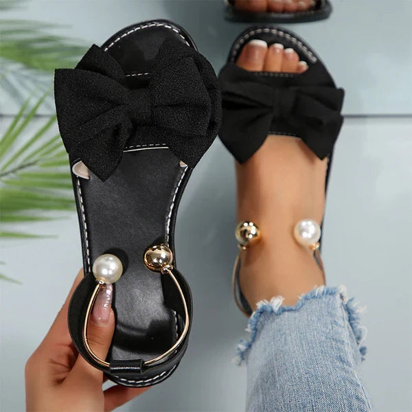 Nova - Sandalias de tiras elegantes con detalle de perla