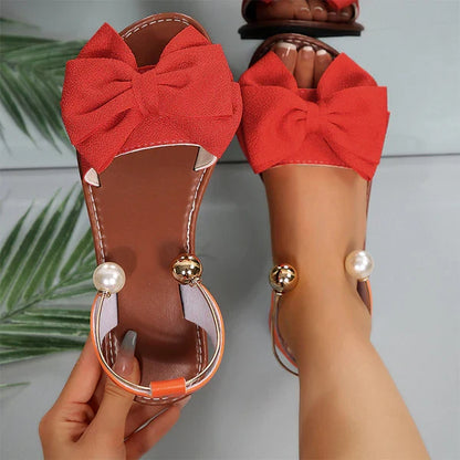 Nova - Sandalias de tiras elegantes con detalle de perla