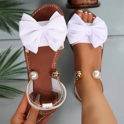 Nova - Sandalias de tiras elegantes con detalle de perla