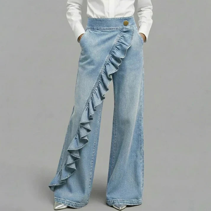 Rebeca - Pantalones denims asimétricos con volante y pernera amplia