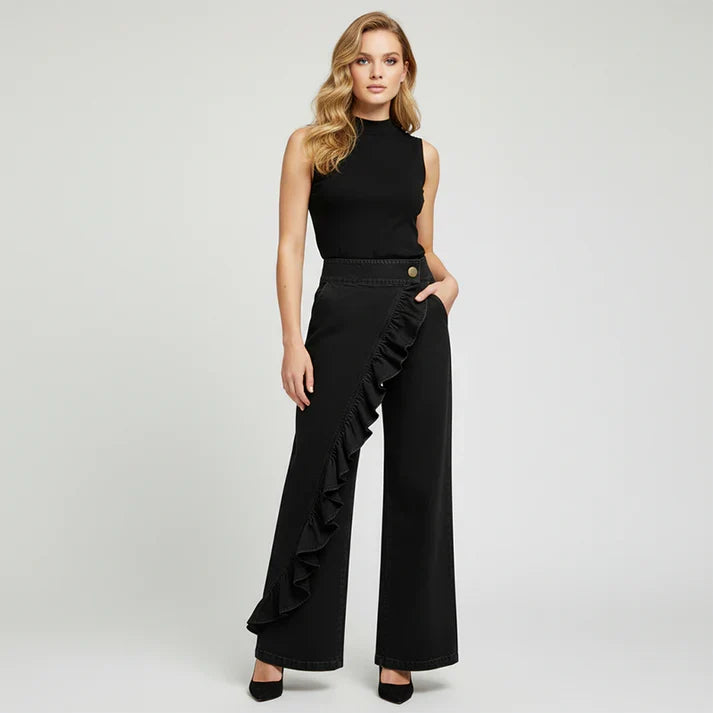 Rebeca - Pantalones denims asimétricos con volante y pernera amplia