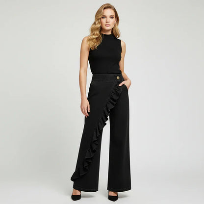Rebeca - Pantalones denims asimétricos con volante y pernera amplia