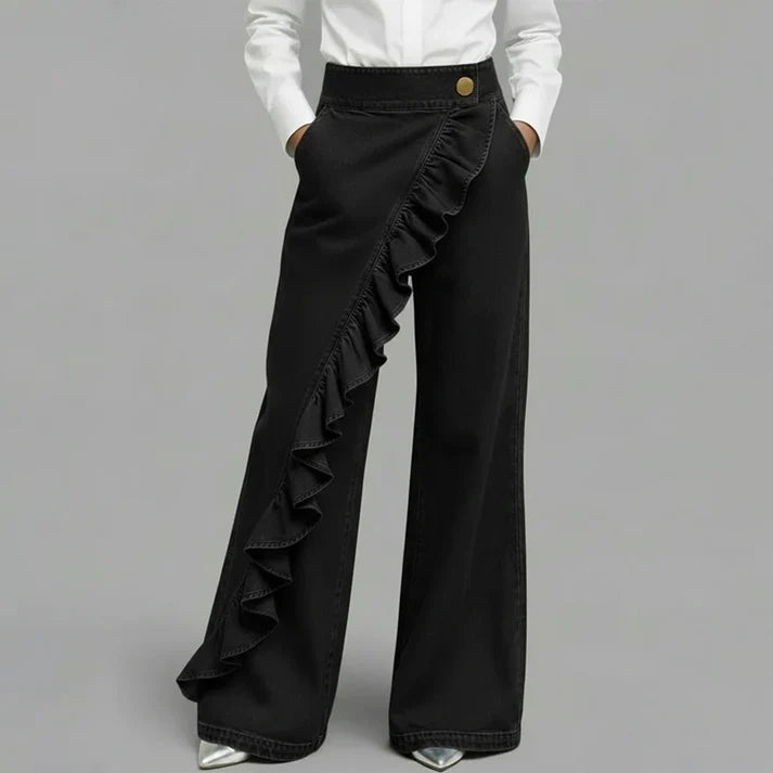 Rebeca - Pantalones denims asimétricos con volante y pernera amplia