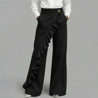 Rebeca - Pantalones denims asimétricos con volante y pernera amplia