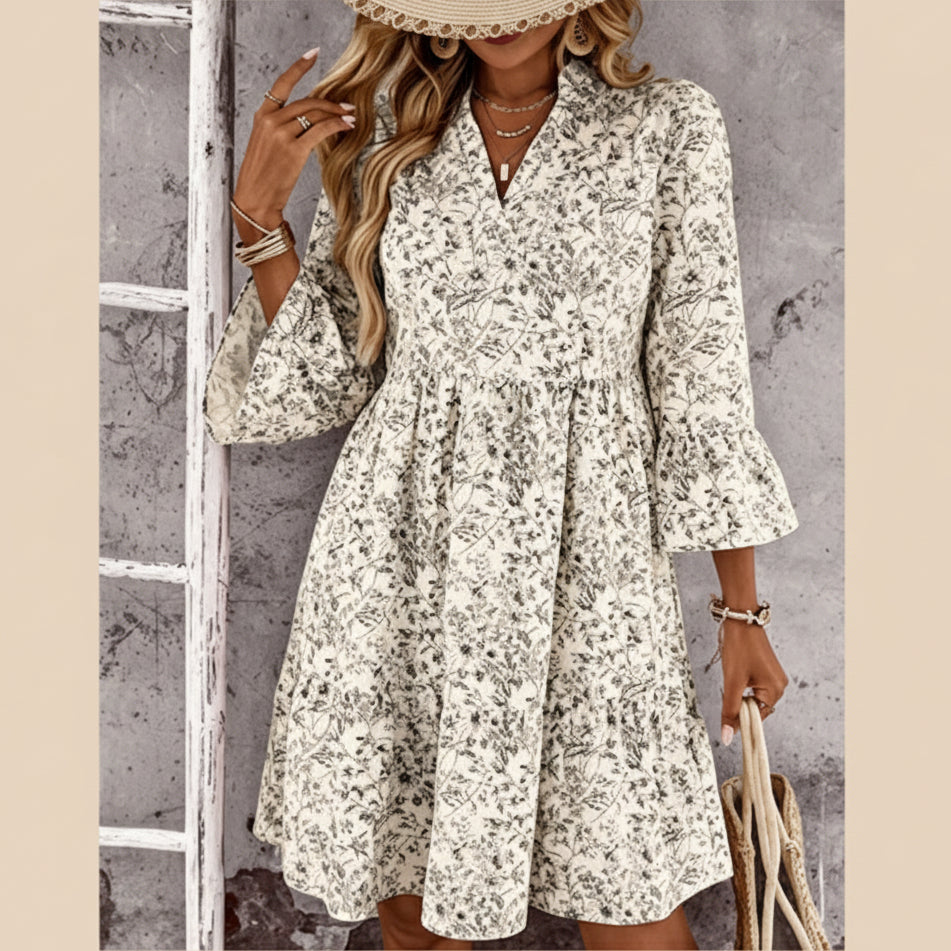 Alba - Vestido con escote de pico y motivo